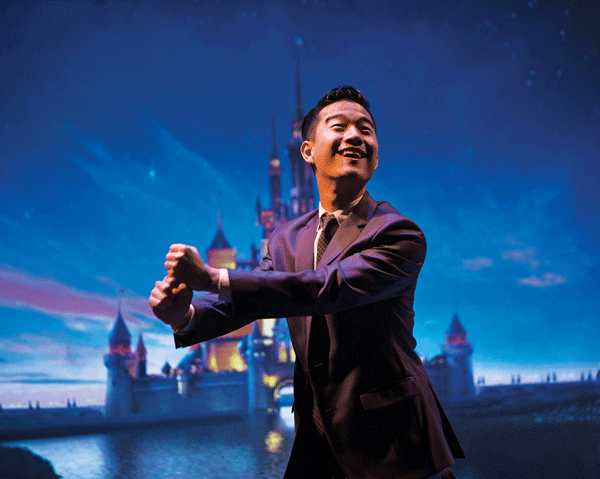 Daniel K. Isaac, as Mickey, embodies the corporation as an entity with court-ordered human rights.  Photo by Thanh Tran