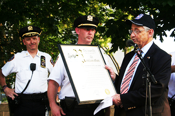 Downtown Express photo by Yannic Rack Assembly Speaker Silver appeared last week at the First Precinct’s National Night Out event.