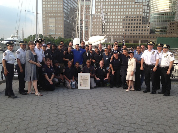 Councilmembeer Margaret Chin, at front on the right side, posed with local police at the event. Photo courtesy of Councilmember Margaret Chin.