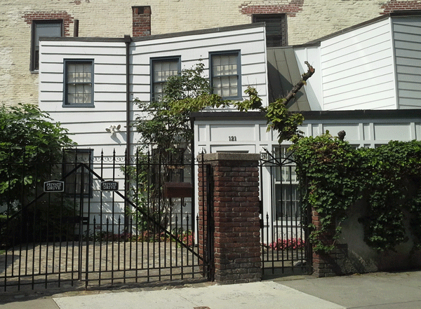 The historic former farmhouse at 121 Charles St.   Photo by Sergei Klebnikov