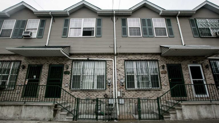 Homes on Mermaid Ave. in Coney Island Brooklyn, on August 1, 2014. By Anthony Lanzilote.