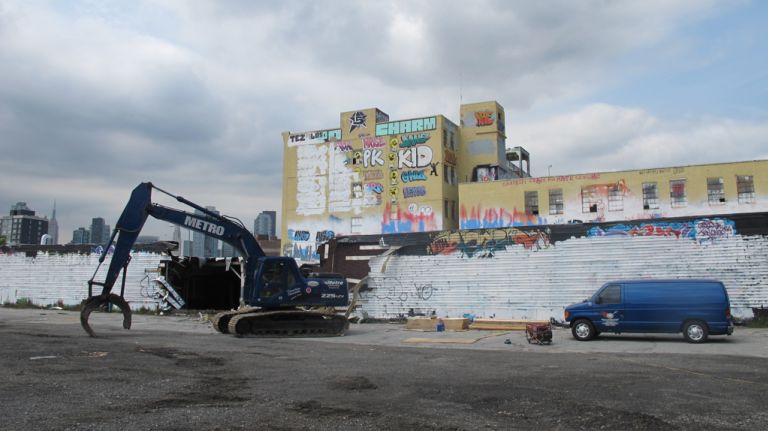 A demolition crew begins the work of dismantling the 5 Pointz graffiti mecca. 