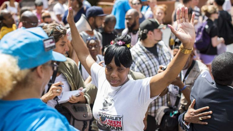 Ramarley Graham's mother Constance Malcom delivered thousands of petitions to the U.S. Department of Justice demanding full DOJ investigation into her sons death on August 20, 2014.