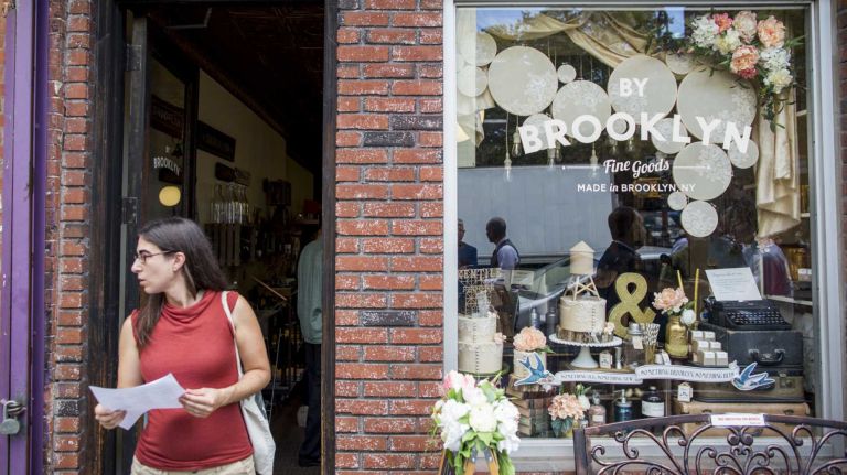A woman leaves By Brooklyn in Carroll Gardens, following the media announcement of products certified 
