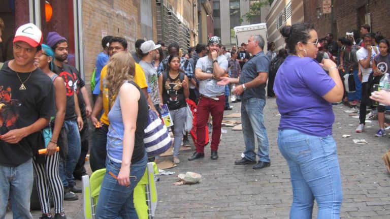 Scoring Comic Con tickets is no joke, fans find 2 Comics fans line up on both sides of Ryders Alley on Aug. 7 waiting to get in to Midtown Comics at 64 Fulton St. to buy tickets for New York Comic Con.