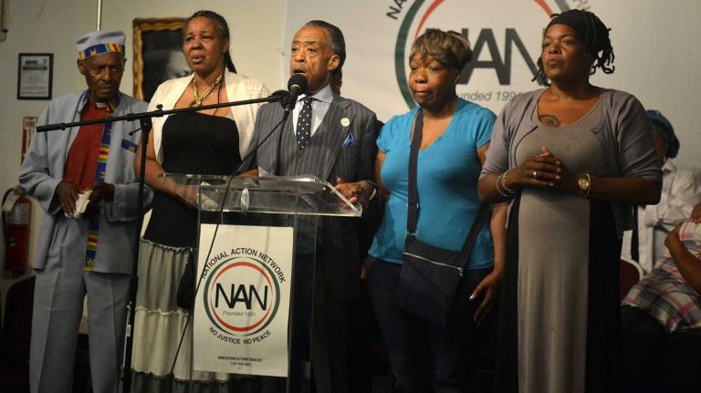 Eric Garner's family members and Al Sharpton at the National Action Network in Harlem on Saturday, July 19, 2014.