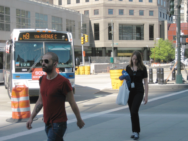 Downtown Express photo by Dusica Sue Malesevic Pedestrians cross West St. at Liberty.