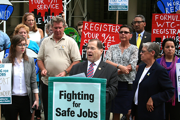 Left to right: NYCOSH executive director Charlene Obernauer, Assemblymember Michael DenDekker, Congressman Jerrold Nadler, 