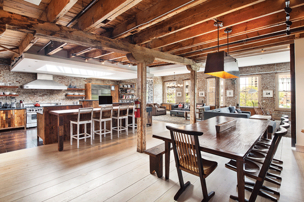 The rustic dining room of the penthouse duplex at 430 E. 10th St. in the East Village.   TOWN RESIDENTIAL