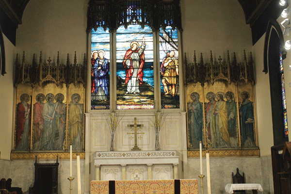 Photo by Jennifer Maguire  This 1900 work by J&R Lamb Studios, with the apt inscription “Follow Me and I Will Make You Fishers of Men,” is in good condition — but other stained glass windows need cleaning and restoring. 