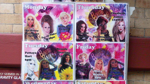 Posters for drag queen performers at Boots N Saddles posted outside the bar on Christopher St.   Photos by Lincoln Anderson