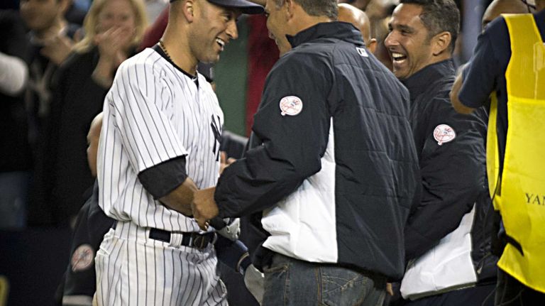 Derek Jeter's final game at Yankee Stadium 105 Yankees' Derek Jeter gets hugs from some of his old teammates after hitting a ninth-inning, game-winning base hit against the Baltimore Orioles at Yankee Stadium on Thursday, Sept. 25, 2014.
