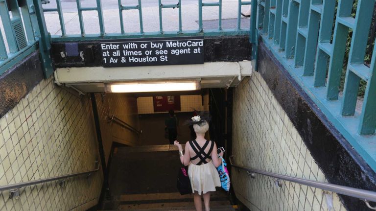 The entrance to the F train on E. Houston and 2nd Ave.