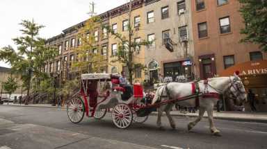 A Handsom Cab travels down Restaurant Row in Hell's Kitchen in Manhattan. (Oct. 4, 2013)??Photo by Anthony Lanzilote