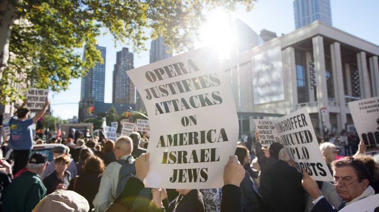 Protestors gathered outside Lincoln Center to demonstrate against the Metropolitan Opera House's decision to air the 