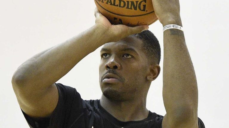 Joe Johnson 28 Nets guard Joe Johnson shoots a free throw during the fourth day of training camp in East Rutherford, N.J. on Tuesday, Sept. 30, 2014.
