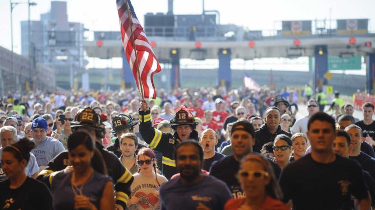 Participants in the 2014 Stephen Siller Tunnel To Towers 5K Run & Walk enter the Brooklyn entrance to the Hugh L. Carey Tunnel on Sunday, Sept. 28, 2014. 