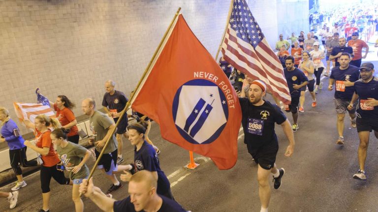 Participants in the Stephen Siller Tunnel To Towers 5K Run & Walk enter the Brooklyn entrance to the Hugh L. Carey Tunnel on Sunday, Sept. 28, 2014. The run follows the footsteps of Firefighter Stephen Siller who abandoned his personal truck on 9/11 in Brooklyn and ran through the tunnel with all his gear to the World Trade Center.