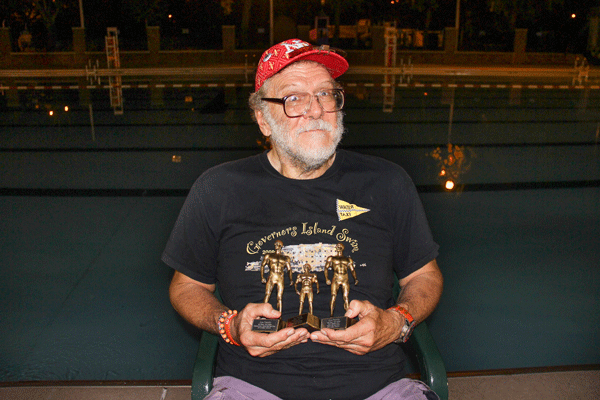 Lew Peterla, of the Village, won three trophies: second place in the Night Owl adult swim at Tony Dapolito; third at the Night Owl swim at Crotona Pool, in the Bronx; and second for the Crotona Early Bird swim.