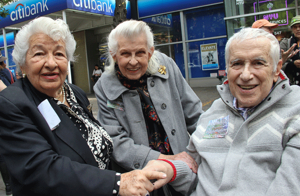 All for one! From left, Connie Masullo, of 505 LaGuardia Place; veteran activist Doris Diether and former Parks Commissioner Henry Stern at Wednesday’s “Save the Village” rally.