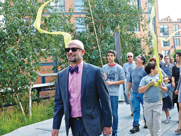 Joshua David, Friends of the High Line’s co-founder, marched in Sunday’s procession at the new section’s grand opening.  PHOTOS BY JENNY RUBIN