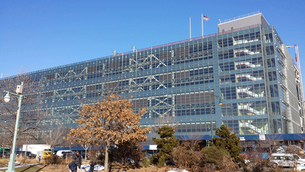Once the new “mega-garage” at Spring and Washington Sts. is completed, the garbage trucks currently on Gansevoort Peninsula will relocate to it.   Photo by Lincoln Anderson