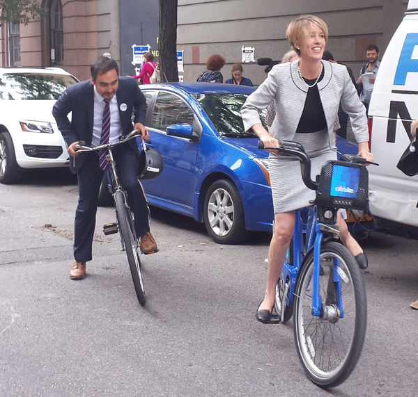 Zephyr Teachout and Tim Wu pedaled off from the L.G.B.T. Center on Tuesday morning as they made the rounds on primary day.  Photo by Lincoln Anderson