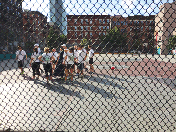 ZogSports kickball players using the playground outside Lower East Side Prep High School, at 145 Stanton St., last Sunday.    PHOTO BY JAMES OO