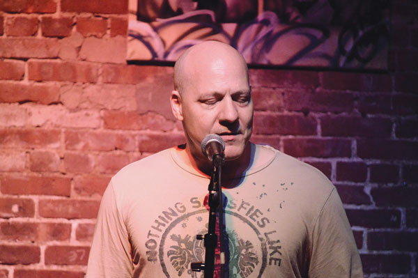 Spoken word on the open mic, at Nuyorican Poets Cafe.  Photo by Lynn Cappiello