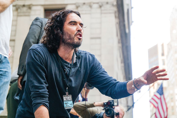 Downtown Express photo by Milo Hess Russell Brand came to Zuccotti Park and Federal Hall in Lower Manhattan Oct. 14. 