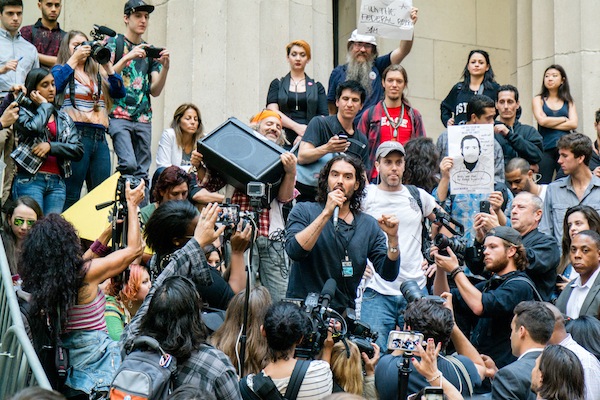 Russell Brand came to Zuccotti Park and Federal Hall in Lower Manhattan Oct. 14. Downtown Express photo by Milo Hess. 