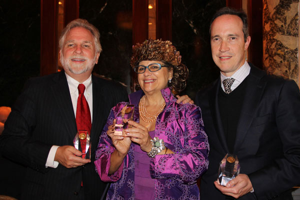 From left, Randy Mastro, Lois Rakoff and Jim Walden proudly display their LaGuardia Medallions.  Photo by Tequila Minsky