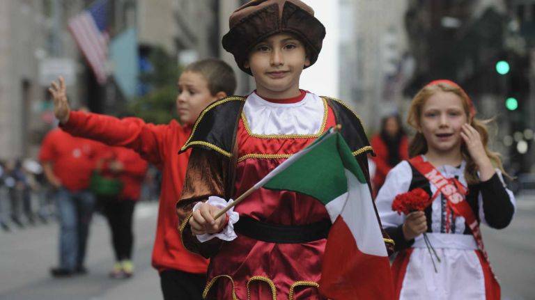 A person dressed as a young Christopher Columbus marches in the 70th Annual Columbus Day Parade in New York City, Monday, October 13, 2014.The parade is billed as the world's largest celebration of Italian-American heritage and culture.