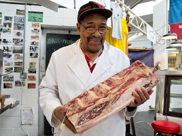 Dionisio Silva at the Essex St. Market.  Photo by Zach Williams