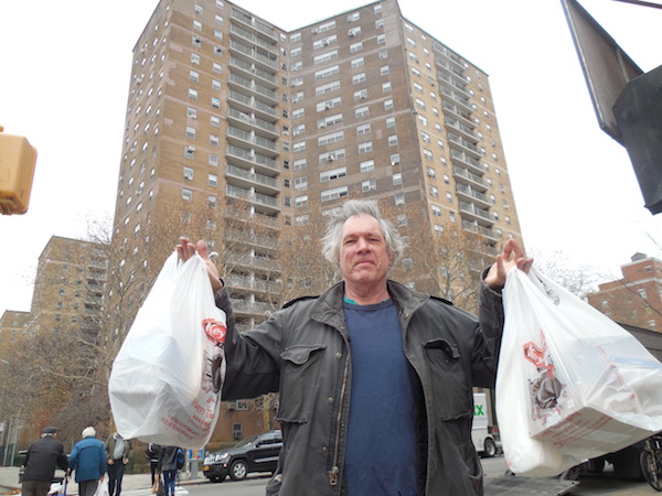 Dennis Phandular said a 10-cent fee for plastic and paper bags is “silly,” and that merchants should instead just ask if shoppers want a bag.  Photo by Gerard Flynn
