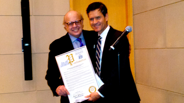 State Senator Brad Hoylman, a former C.B. 2 chairperson, right, presented David Gruber with a proclamation in honor of his leadership of the community board.  Photos by The Villager