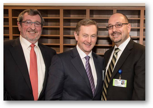 From left, Michael Dowling, Irish Taoiseach Enda Kenny and Alex Hellinger.