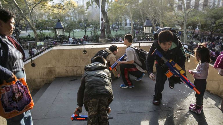 Kids play in the pavilion in Columbus Park in Chinatown in Manhattan, on Nov. 4, 2014.