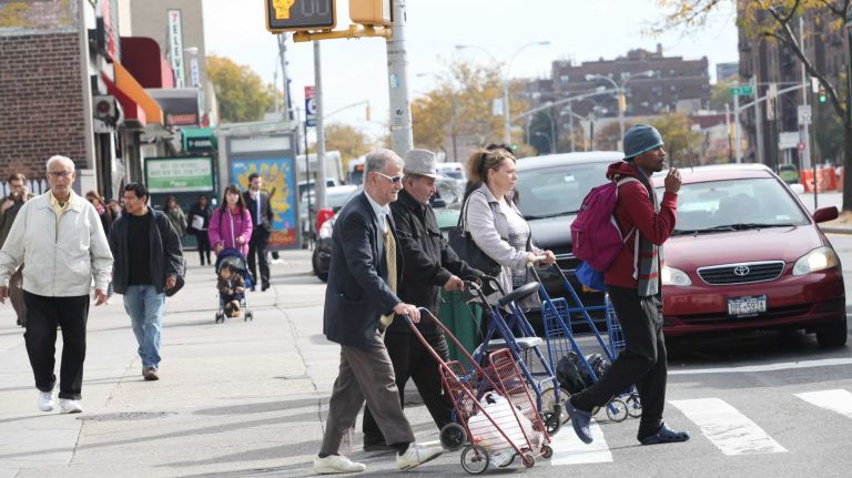 Crossing Queens Blvd. at 63rd Rd. in Rego Park.