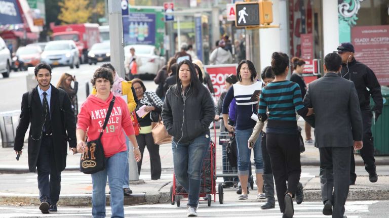 Crossing Queens Blvd. at 63rd Rd.in Rego Park.