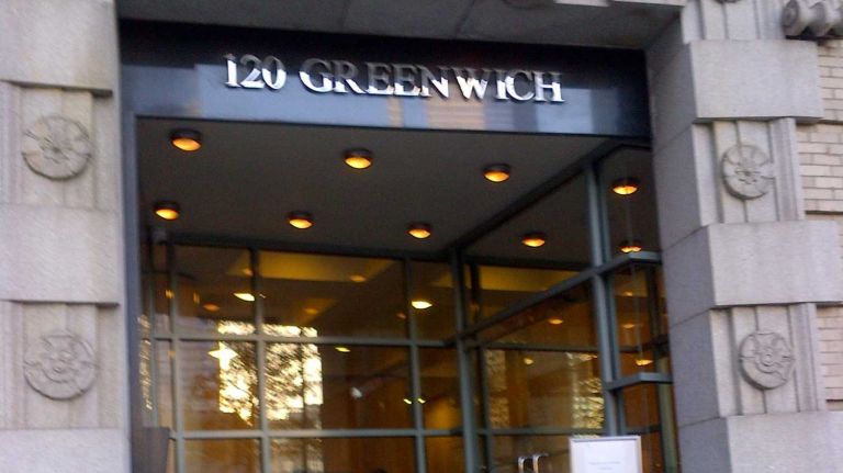 Outside the apartment building of 42-year-old Shawn Miller, a Citigroup manager who was found with his throat slit on Tuesday November 18, 2014.