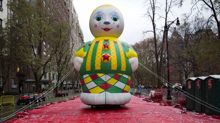 Macy's Thanksgiving Day Parade photos 12 A rolling balloon stands at the ready as the 88th Macy's Thanksgiving Day Parade balloons are prepared and inflated near the Museum of Natural History on Central Park Wes Wednesday, Nov. 26, 2014, in preparation for the Thanksgiving Day parade that ends in front of Macy's Herald Square.