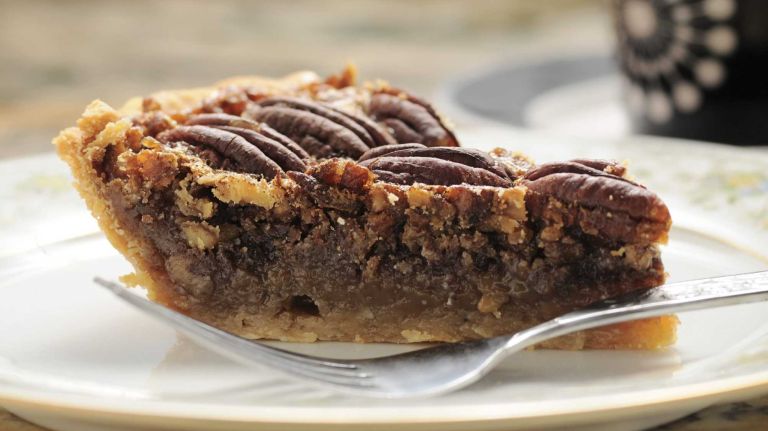Watch out for holiday foods that pack a high-calorie punch, like pecan pie, advises registered dietitian Kristy Del Coro.