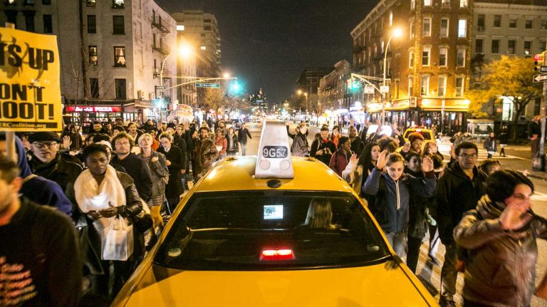 Protesters gather in Lower Manhattan on Tuesday, Nov. 25, 2014, in response to the grand jury decision regarding the fatal shooting of Michael Brown in Ferguson, Mo.