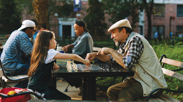Max (Makenna Ballard) and Norman (F. Murray Abraham) lock horns and match wits, in Washington Square Park.