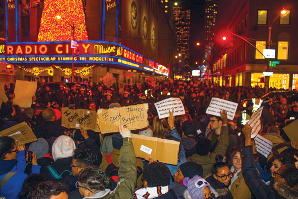 Activists Say #ThisStopsToday 7 Photos by Zach Williams On Dec. 3, the NYPD blocked the way for protesters trying to reach Rockefeller Center (and the tree-lighting ceremony).