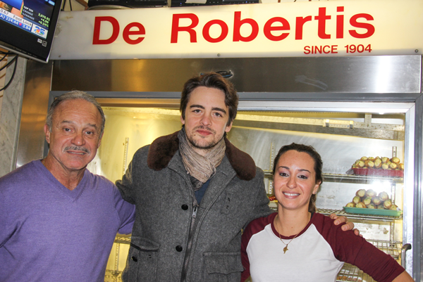 John De Robertis, Jr., left, and his daughter, Dana, right, with actor Vincent Piazza on the pasticceria’s closing day.   Photos by Tequila Minsky