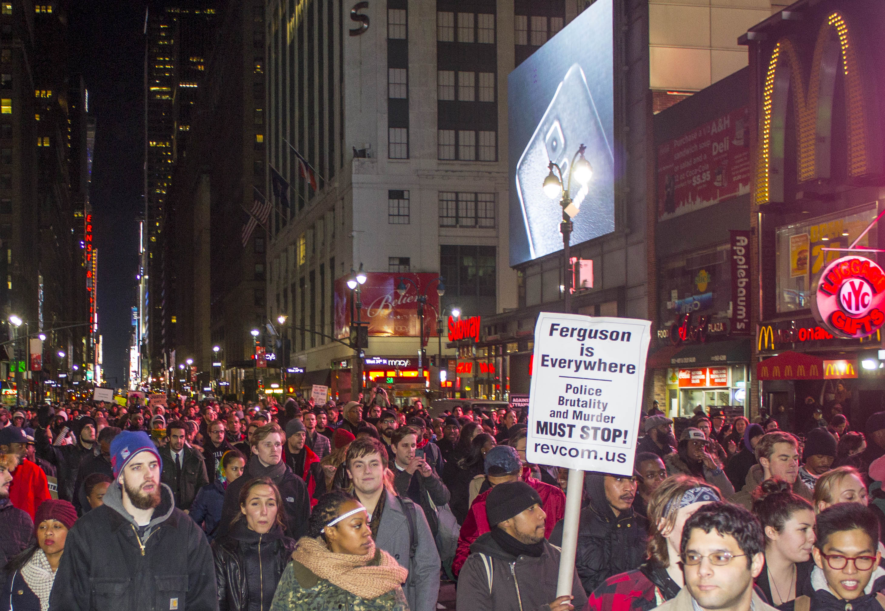 After marching on the West Side Highway as far north as W. 72nd St., hundreds of demonstrators turned south and arrived at Times Square at about 10:30 p.m.