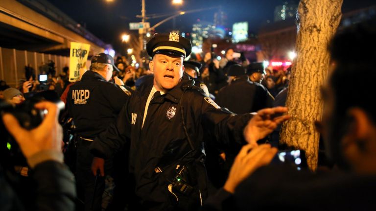 Police clash with protesters on the West Side Highway on December 3, 2014.