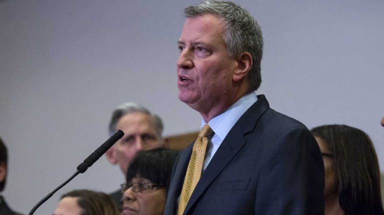 In the wake of a grand jury decision on Wednesday, Dec. 3, 2014, New York City Mayor Bill de Blasio speaks at a news conference.